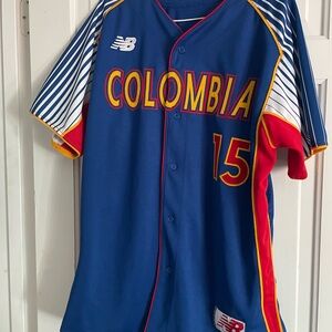 New Balance Blue Jersey with Red and Yellow Trim